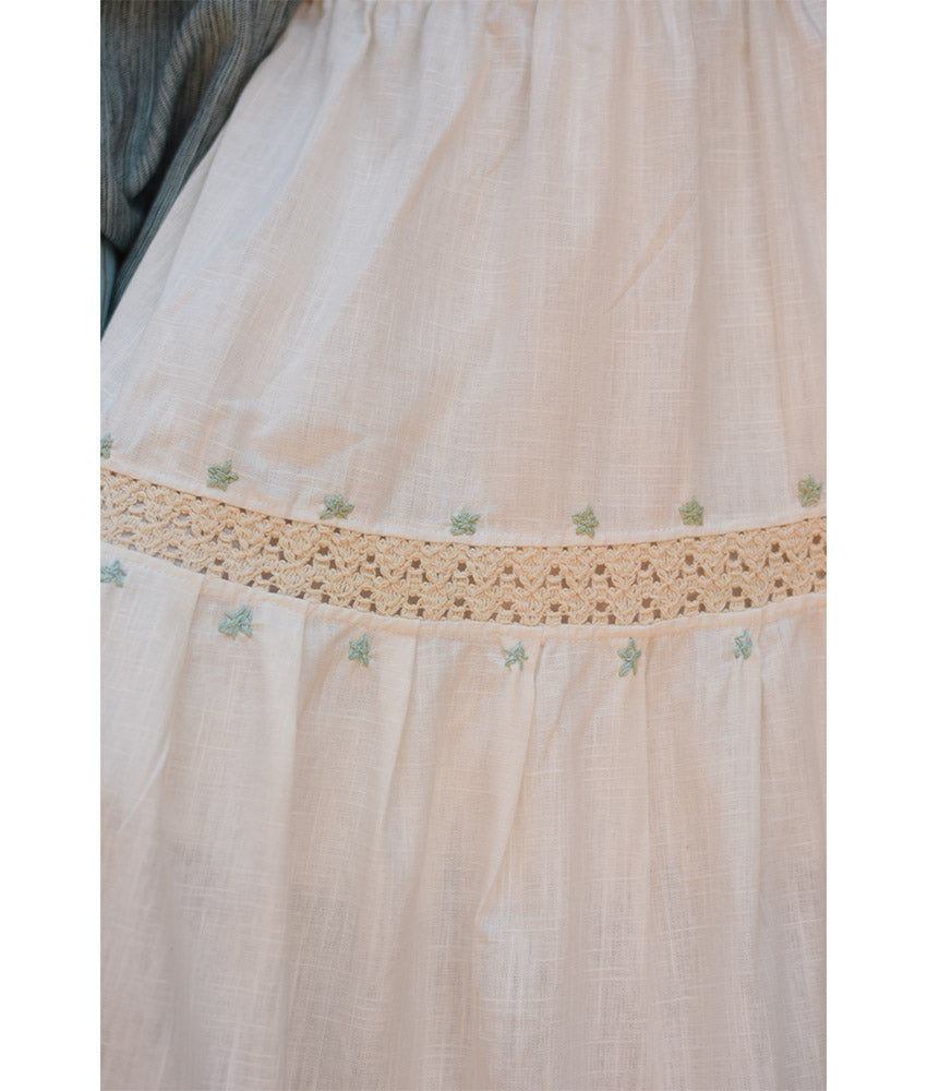 White Linen Skirt with Hand Embroideries handmade in Egypt & available at Jozee Boutique.