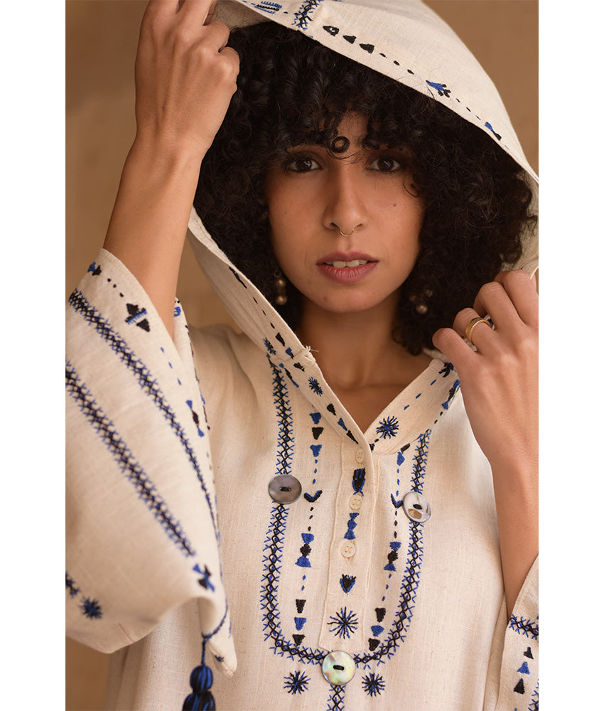 Off white Siwa Embroidered Linen Dress with Hoodie handmade in Egypt & available at Jozee Boutique.