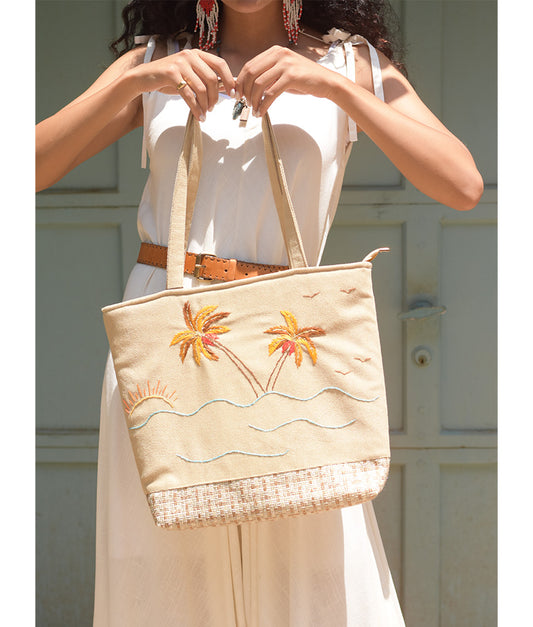 Off white Embroidered Palm Linen Tote Bag handmade in Egypt & available at Jozee Boutique.handmade in Egypt & available at Jozee Boutique.