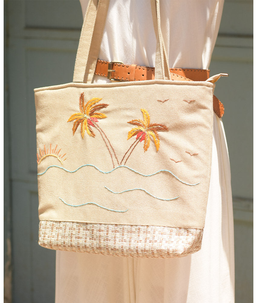 Off white Embroidered Palm Linen Tote Bag handmade in Egypt & available at Jozee Boutique.handmade in Egypt & available at Jozee Boutique.