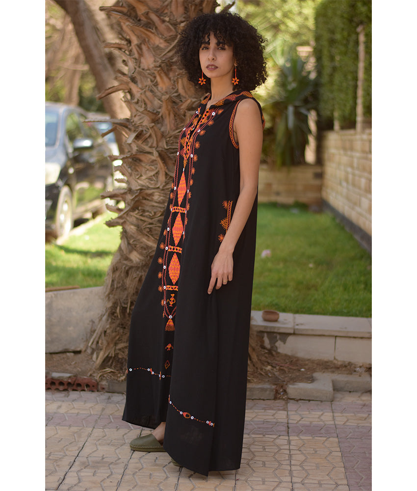 Black Siwa Heavily Embroidered Linen Dress with Hoodie handmade in Egypt & available at Jozee Boutique.