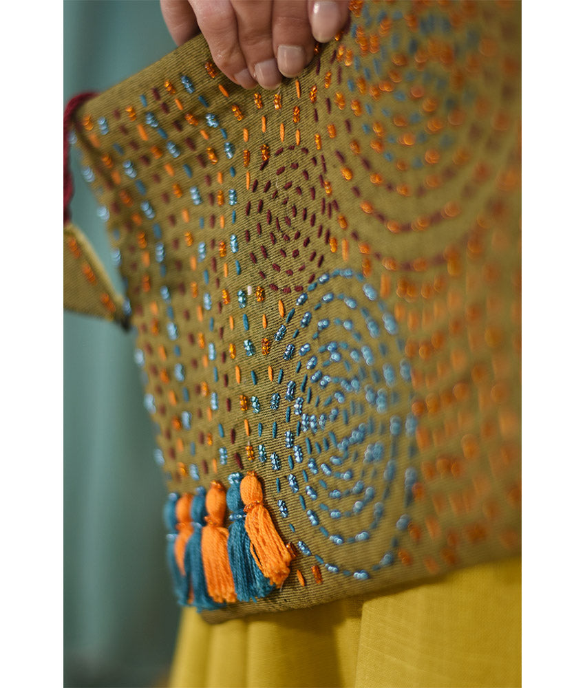Green Embroidered Clutch handmade in Egypt & available at Jozee Boutique.