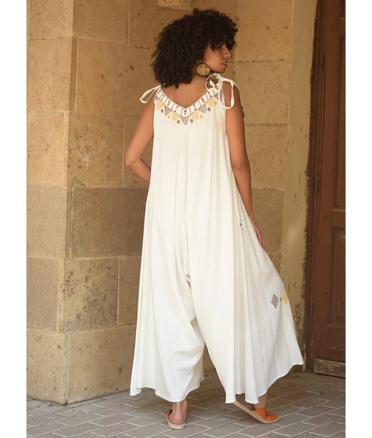 White Siwa Embroidered Linen Flowy Jumpsuit/Dress handmade in Egypt & available at Jozee Boutique.