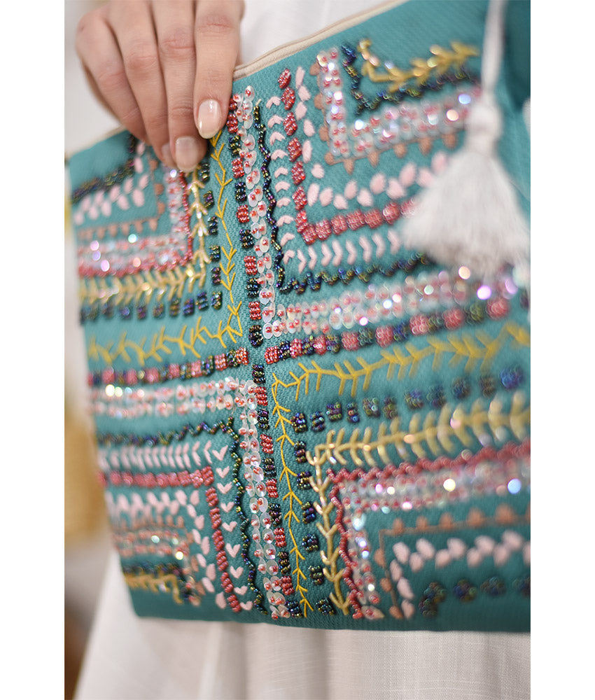 Turquoise Embroidered Clutch handmade in Egypt & available at Jozee Boutique.