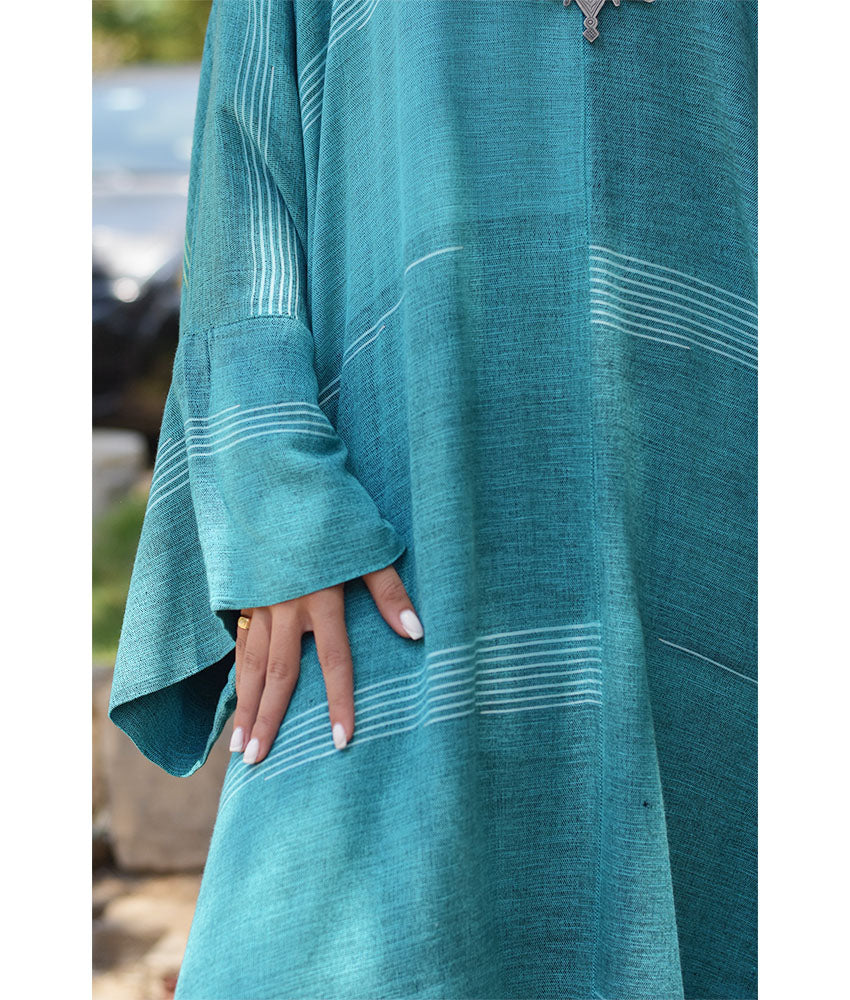 Turquoise Viscose Kaftan with Hoodie handmade in Egypt & available at Jozee Boutique.