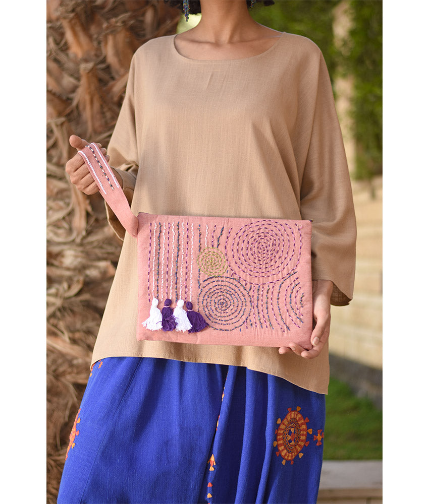 Saumon Embroidered Clutch handmade in Egypt & available at Jozee Boutique.