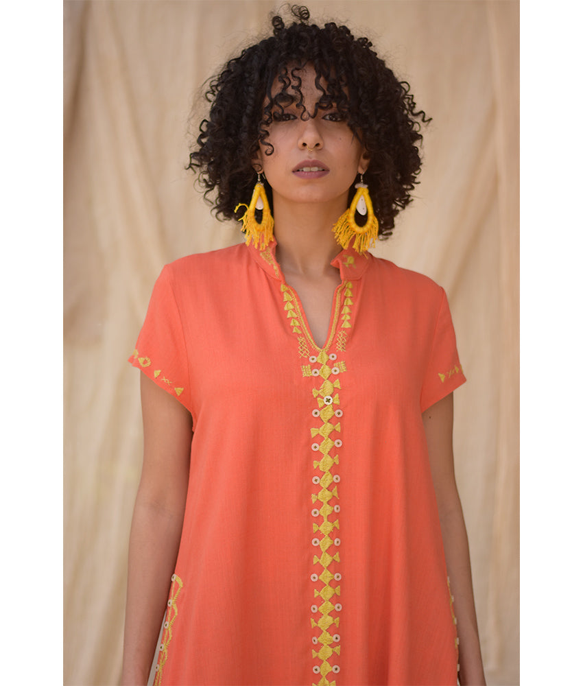 Orange Siwa Embroidered Linen Japanese Dress handmade in Egypt & available at Jozee Boutique.