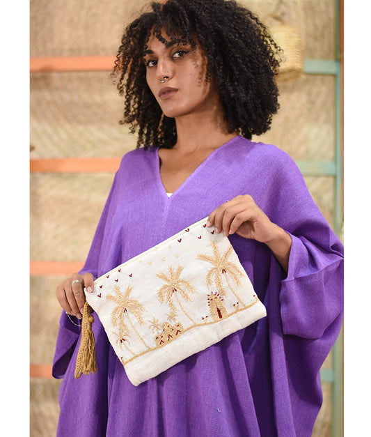 Off White Embroidered Clutch handmade in Egypt & available at Jozee Boutique.