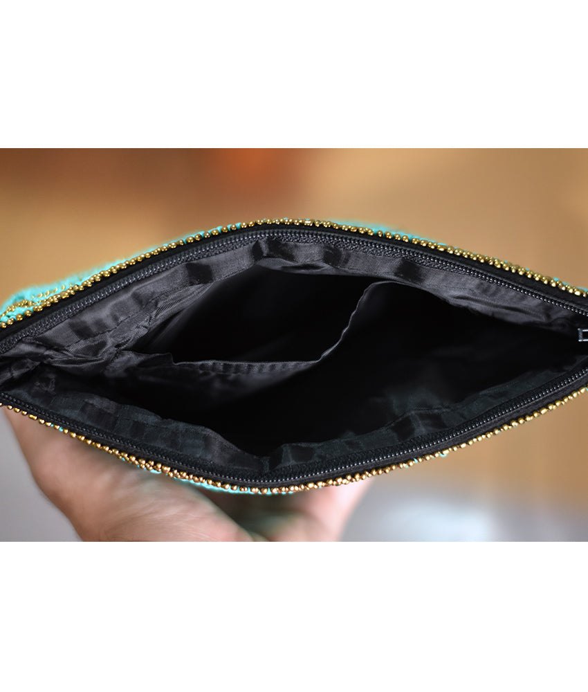 Black, Turquoise & Gold Beaded Clutch handmade in Egypt & available at Jozee Boutique.