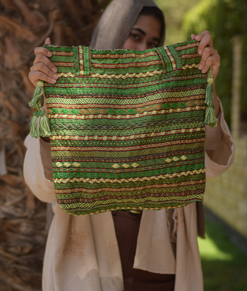 Green Beaded Saint Catherine handbag handmade in Egypt & available in Jozee boutique
