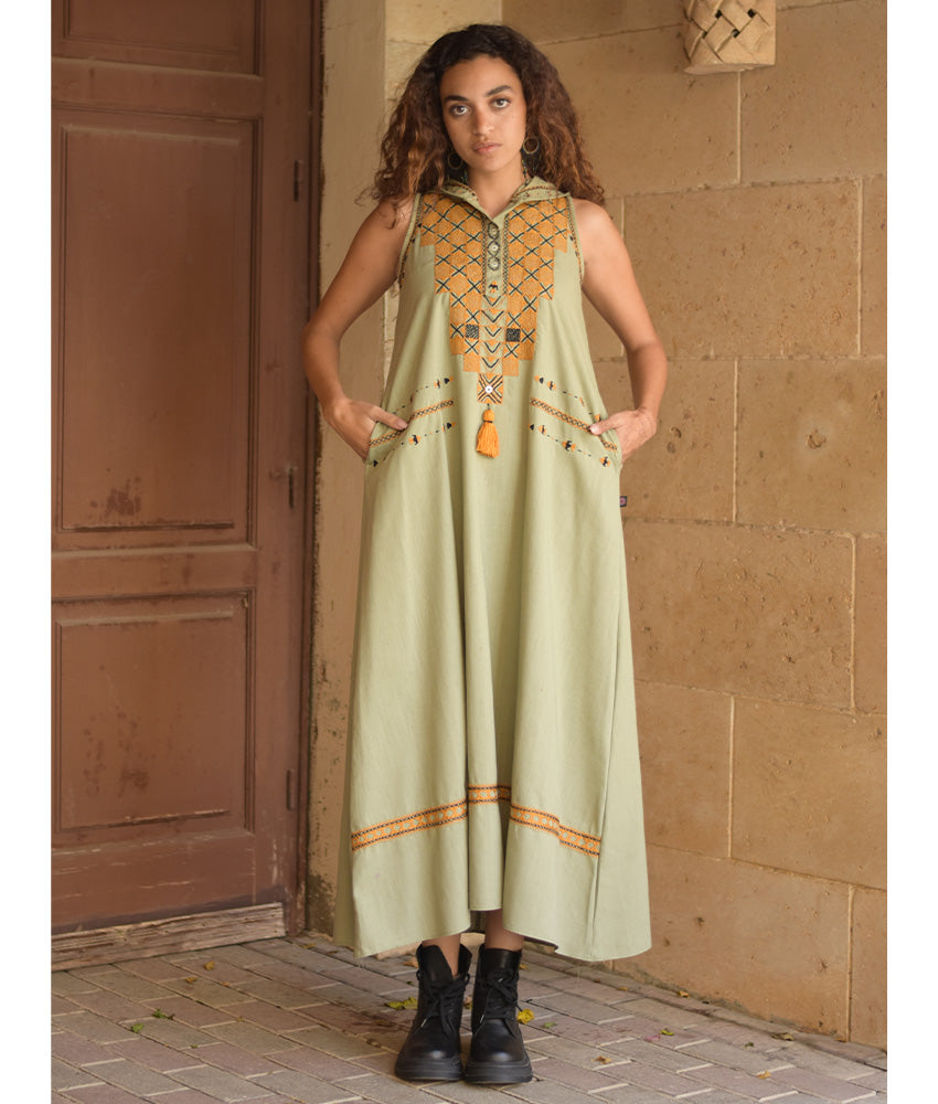 Light olive Siwa Heavily Embroidered Linen Dress with Hoodie handmade in Egypt & available at Jozee Boutique.