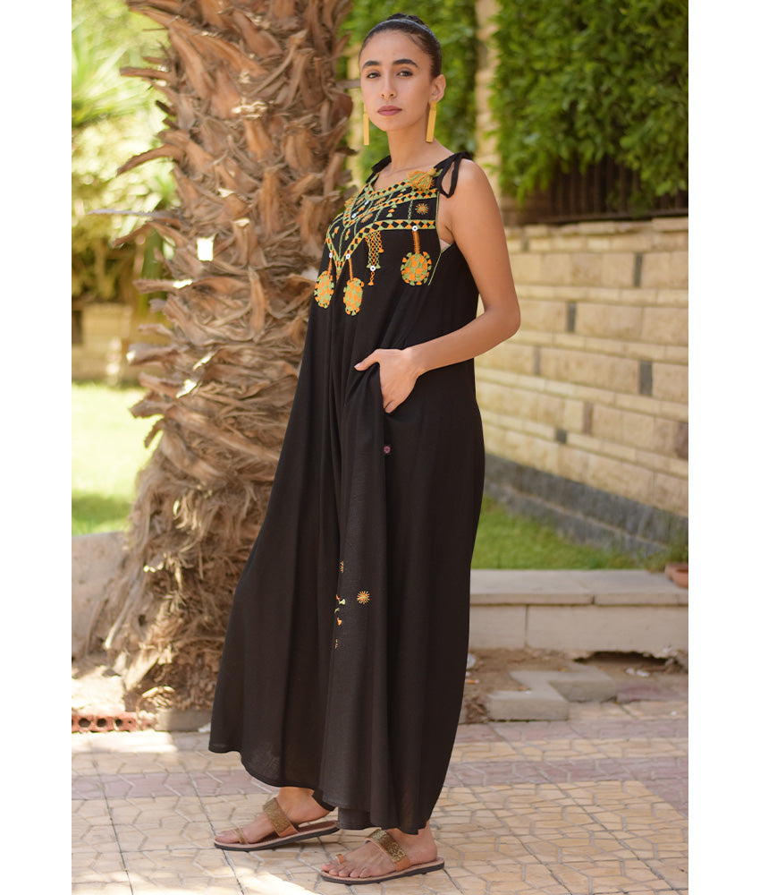 Black Siwa Embroidered Linen Flowy Jumpsuit/Dress handmade in Egypt & available at Jozee Boutique.