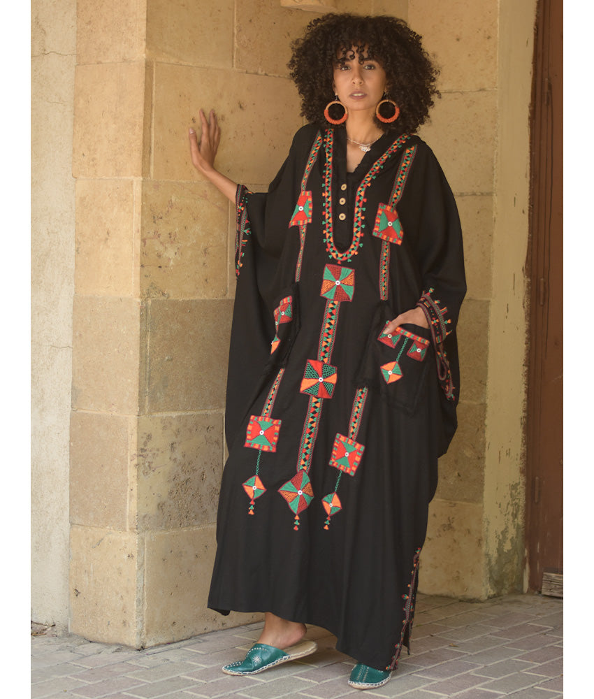 Black Siwa Embroidered Linen Kaftan with Hoodie handmade in Egypt & available at Jozee Boutique.