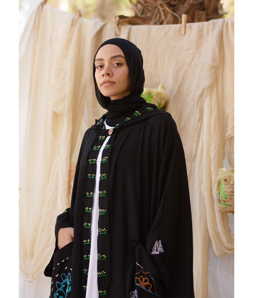 Black Hand Embroidered Linen Cardigan/Abaya with Hoodie handmade in Egypt & available at Jozee Boutique.