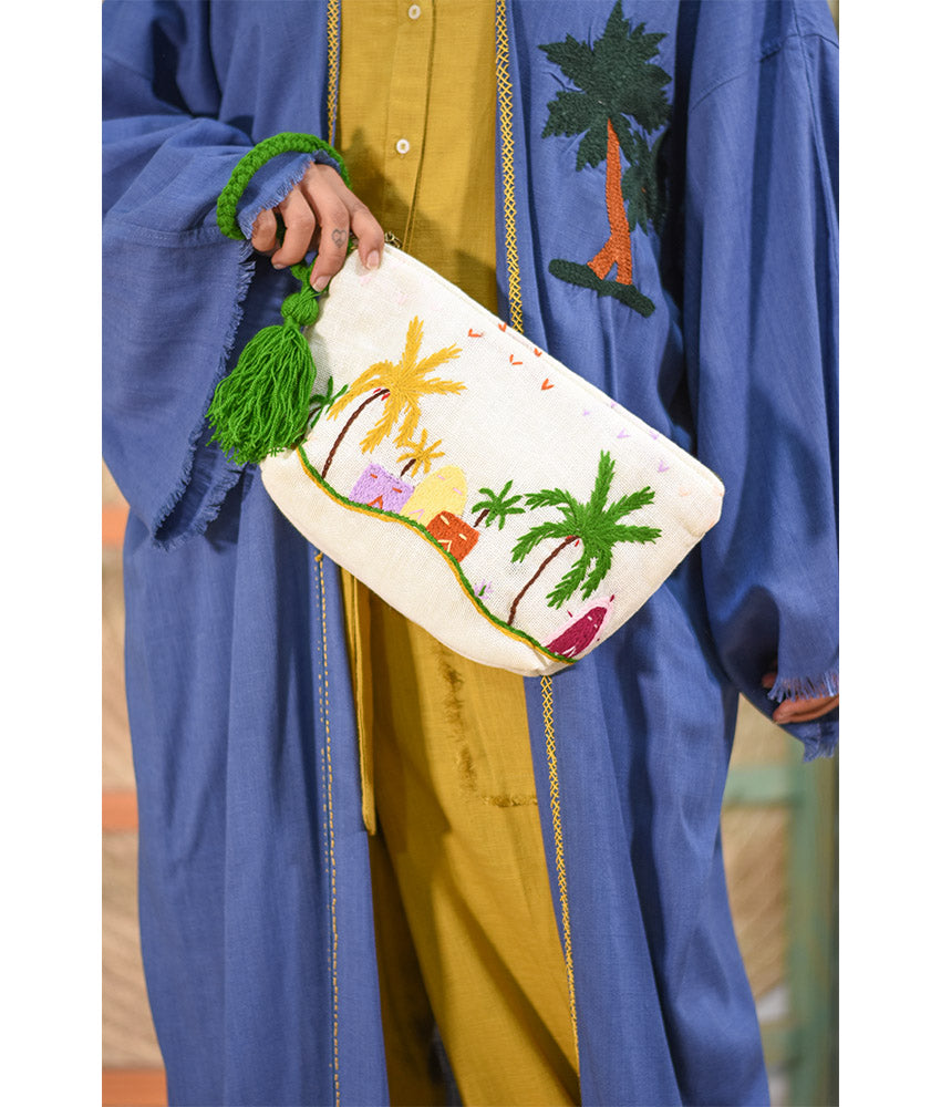 Off White Embroidered Clutch handmade in Egypt & available at Jozee Boutique.