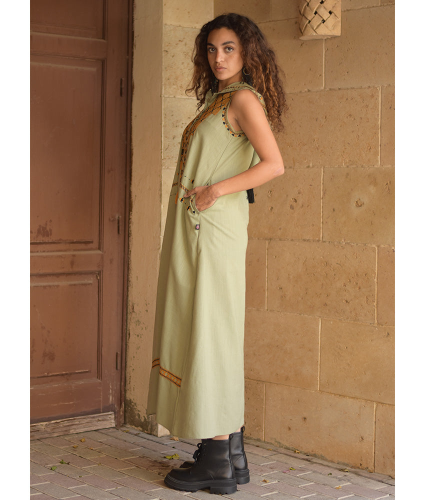 Light olive Siwa Heavily Embroidered Linen Dress with Hoodie handmade in Egypt & available at Jozee Boutique.