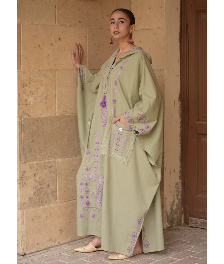 Light olive Siwa Embroidered Linen Kaftan with Hoodie handmade in Egypt & available at Jozee Boutique.