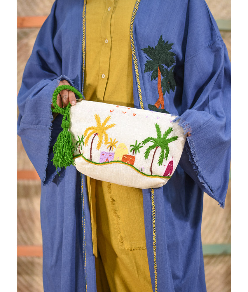 Off White Embroidered Clutch handmade in Egypt & available at Jozee Boutique.