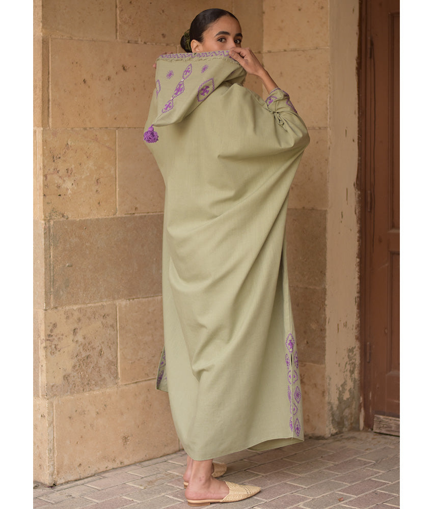 Light olive Siwa Embroidered Linen Kaftan with Hoodie handmade in Egypt & available at Jozee Boutique.