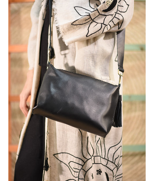 Black Hand Stitched Leather Cross Bag with Beads handmade in Egypt and available at Jozee Boutique.