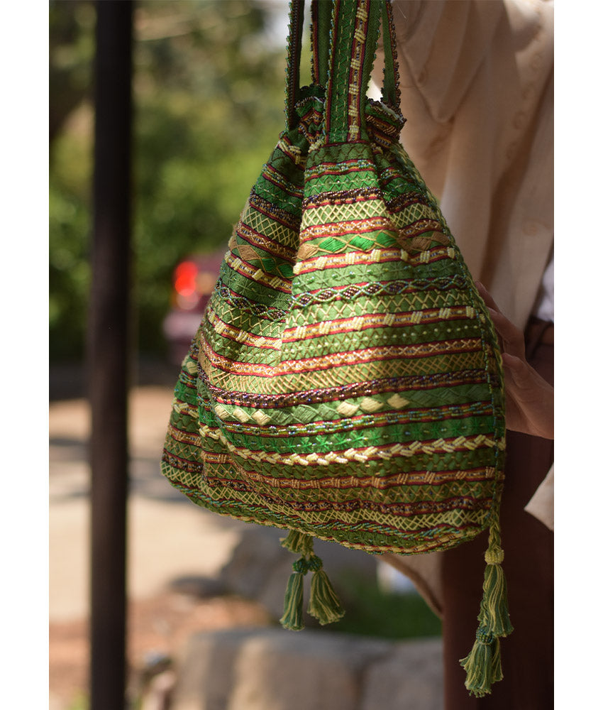 Green Beaded Saint Catherine handbag handmade in Egypt & available in Jozee boutique