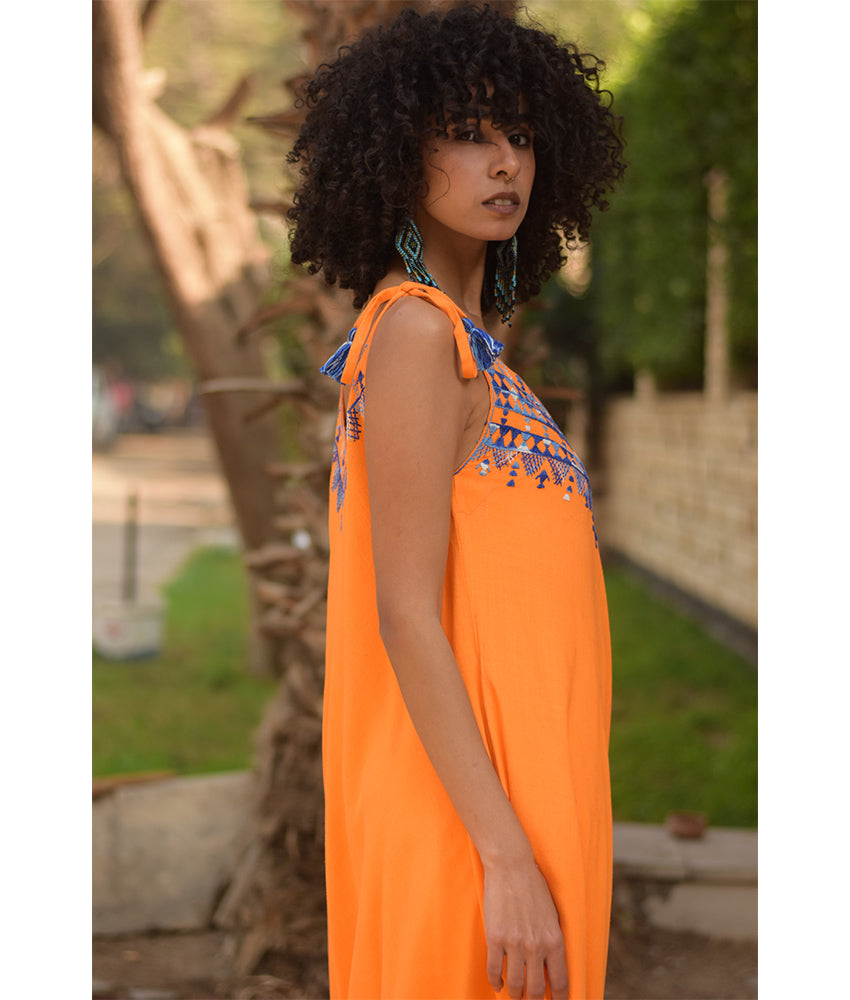 Orange Siwa Embroidered Linen Flowy Jumpsuit/Dress handmade in Egypt & available at Jozee Boutique.
