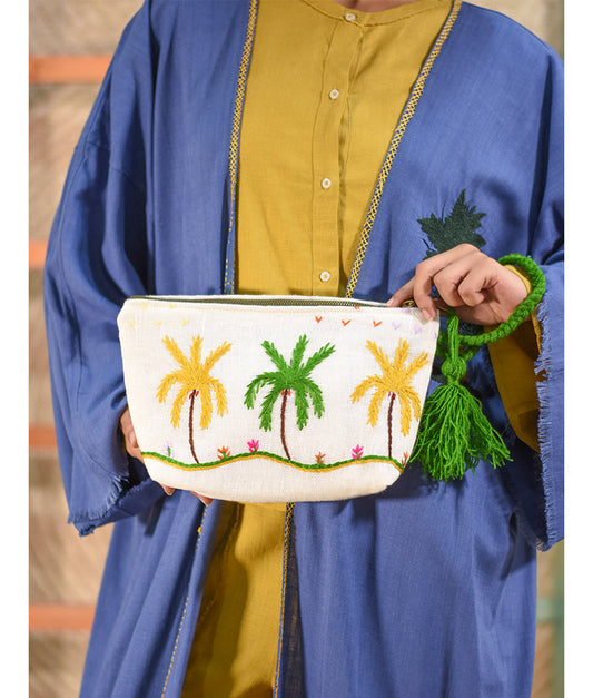 Off White Embroidered Clutch handmade in Egypt & available at Jozee Boutique.