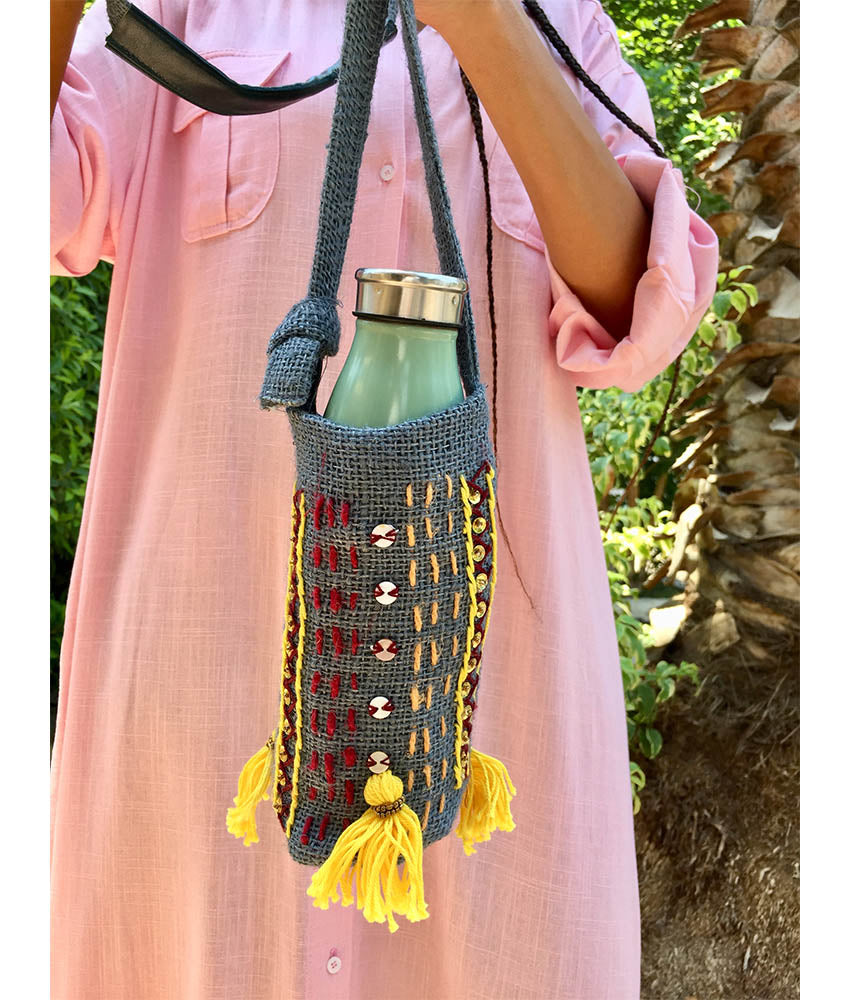 Slate Grey Embroidered Burlap Bottle Cover handmade in Egypt & available at Jozee Boutique.