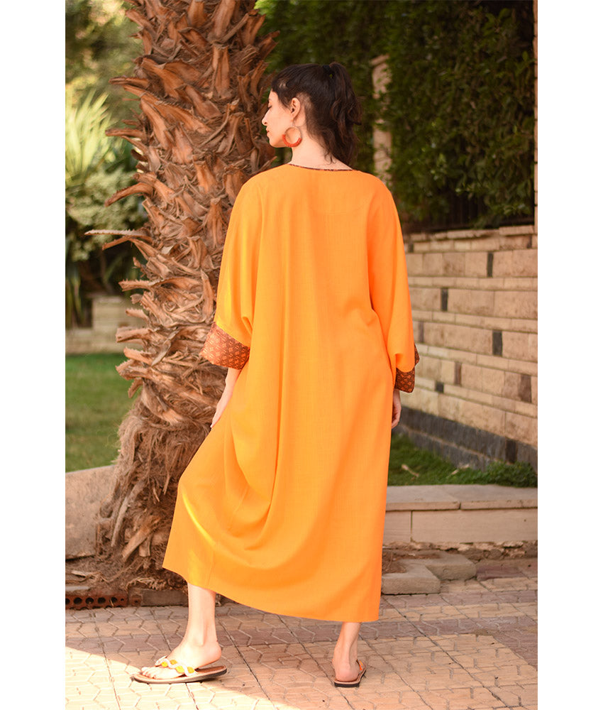 Orange Linen Kaftan with Silk & Cotton Loom Woven Patches handmade in Egypt & available at Jozee Boutique.