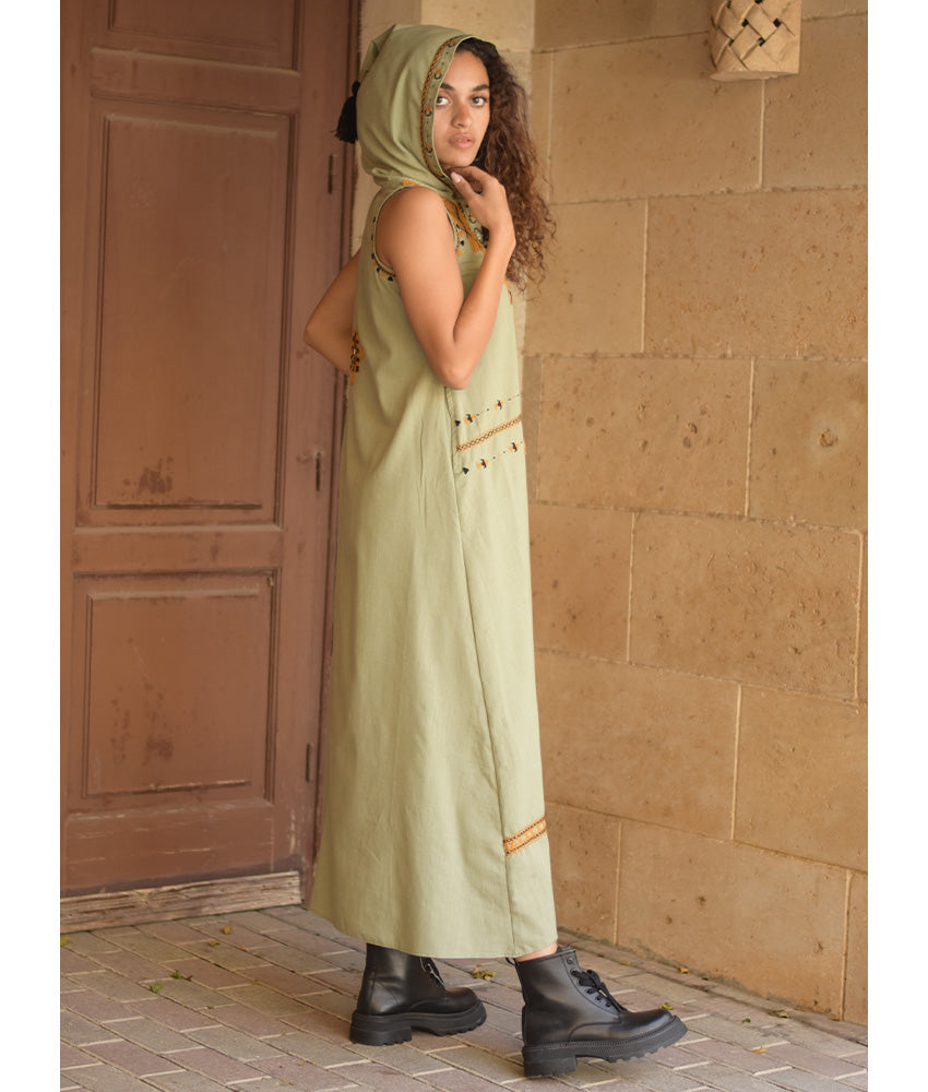 Light olive Siwa Heavily Embroidered Linen Dress with Hoodie handmade in Egypt & available at Jozee Boutique.