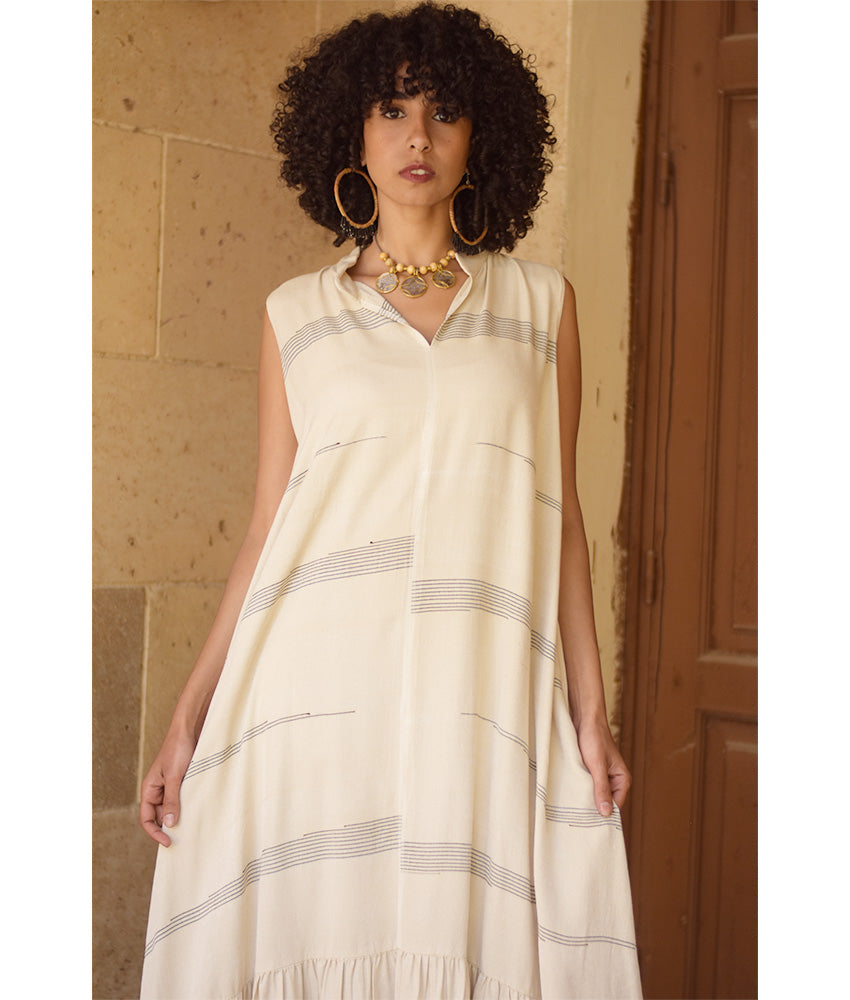 Off White Handwoven Ruffle Dress Handmade in Egypt & available at Jozee Boutique