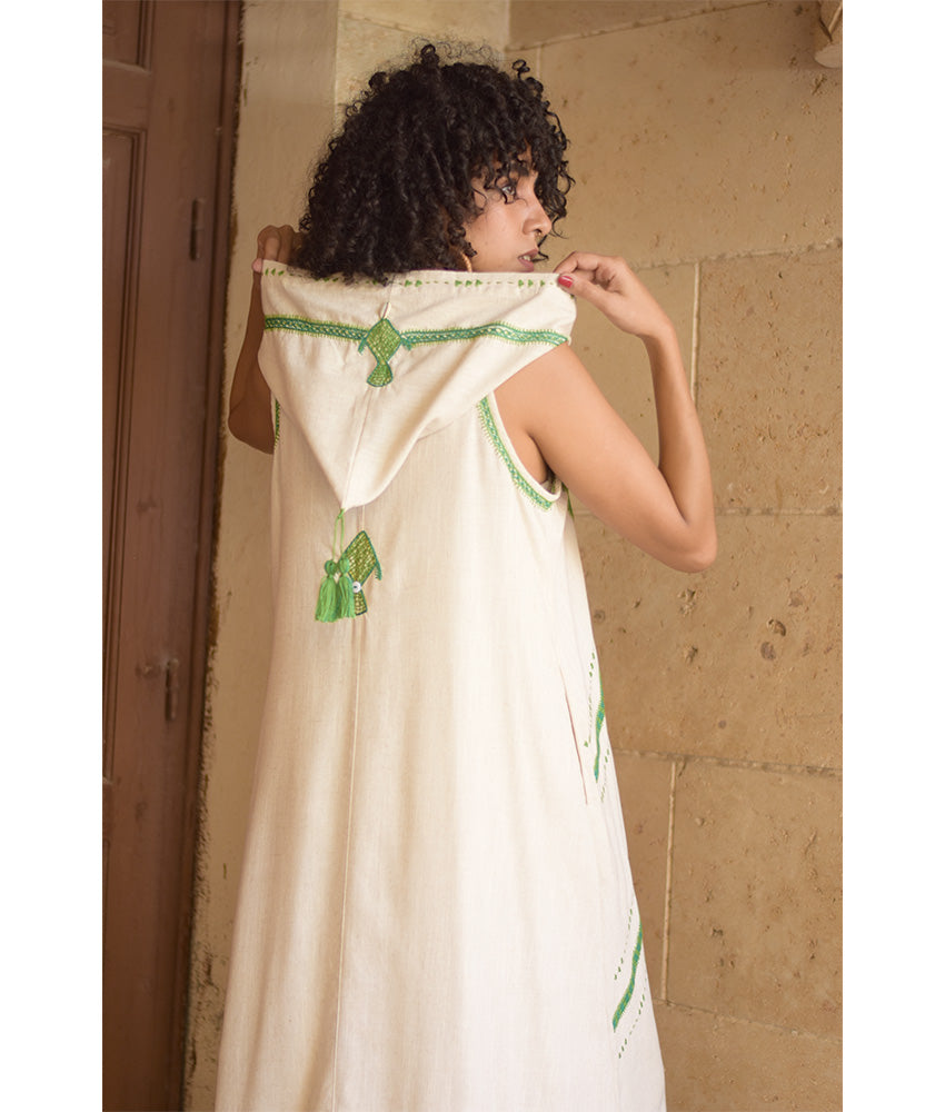 Off white Siwa Embroidered Linen Dress with Hoodie handmade in Egypt & available at Jozee Boutique.