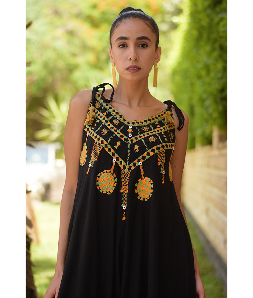 Black Siwa Embroidered Linen Flowy Jumpsuit/Dress handmade in Egypt & available at Jozee Boutique.