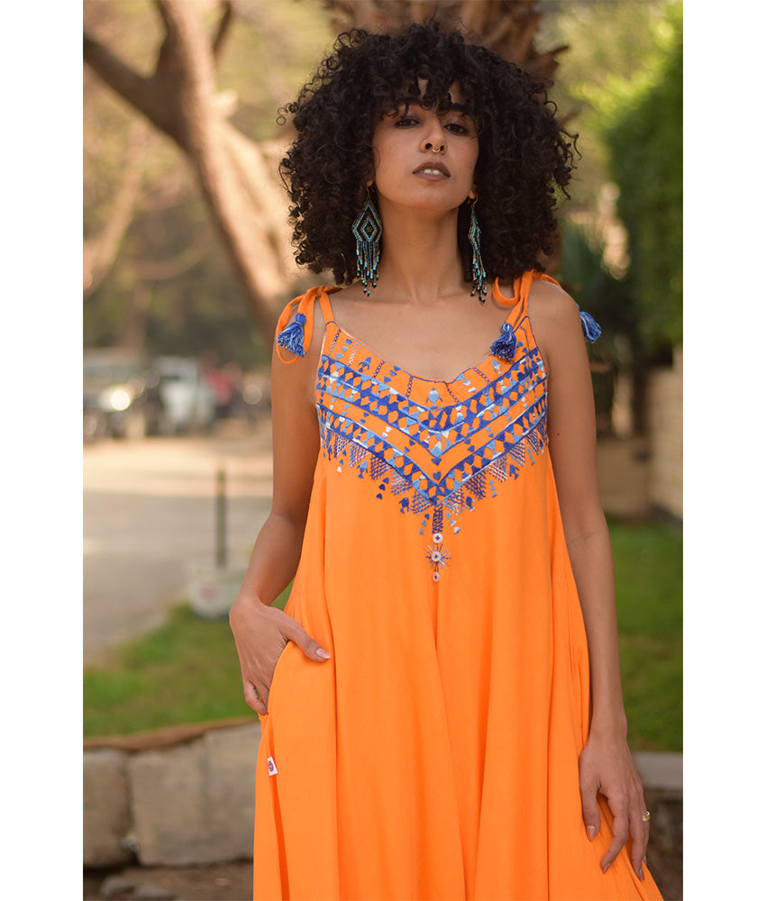 Orange Siwa Embroidered Linen Flowy Jumpsuit/Dress handmade in Egypt & available at Jozee Boutique.