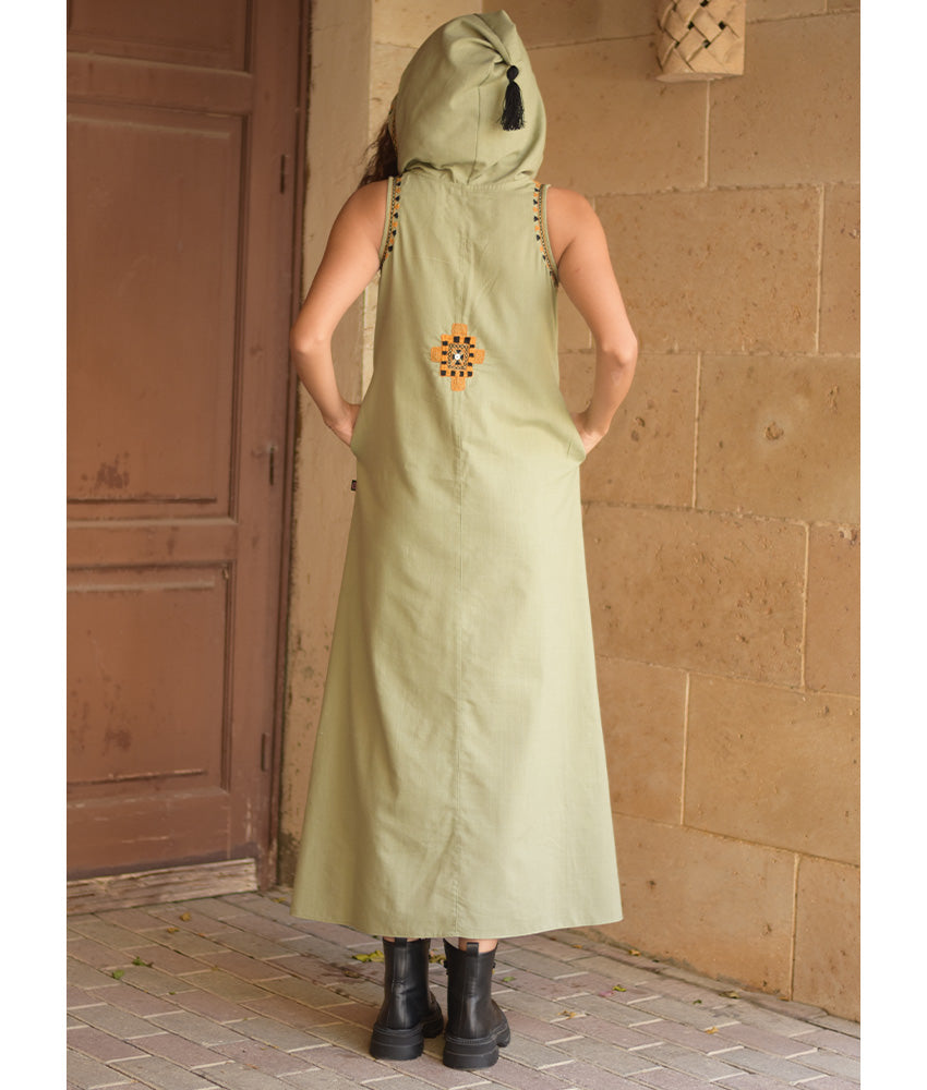 Light olive Siwa Heavily Embroidered Linen Dress with Hoodie handmade in Egypt & available at Jozee Boutique.