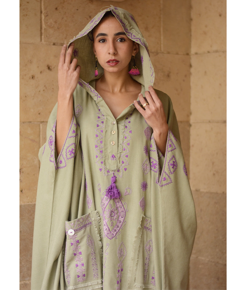 Light olive Siwa Embroidered Linen Kaftan with Hoodie handmade in Egypt & available at Jozee Boutique.