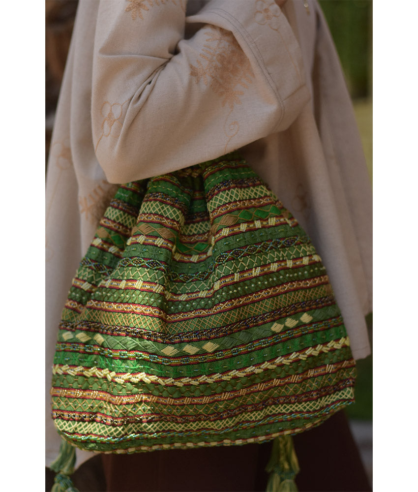 Green Beaded Saint Catherine handbag handmade in Egypt & available in Jozee boutique