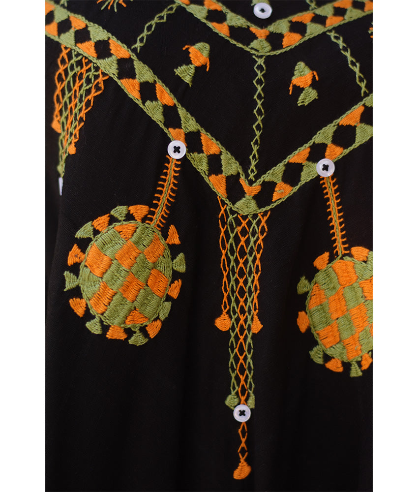 Black Siwa Embroidered Linen Flowy Jumpsuit/Dress handmade in Egypt & available at Jozee Boutique.