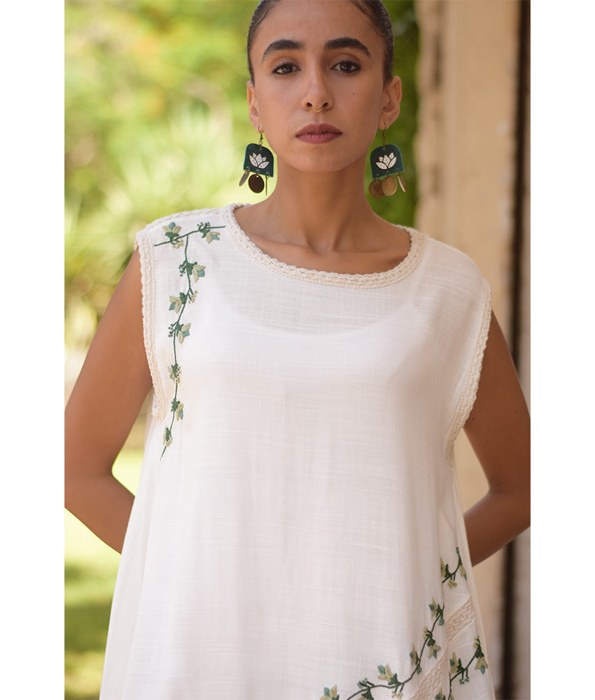 White Linen Dress with Hand Embroideries handmade in Egypt & available in Jozee boutique