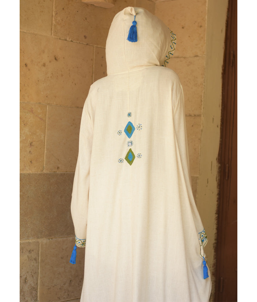 Off white Siwa Embroidered Linen Dress with Hoodie handmade in Egypt & available at Jozee Boutique.