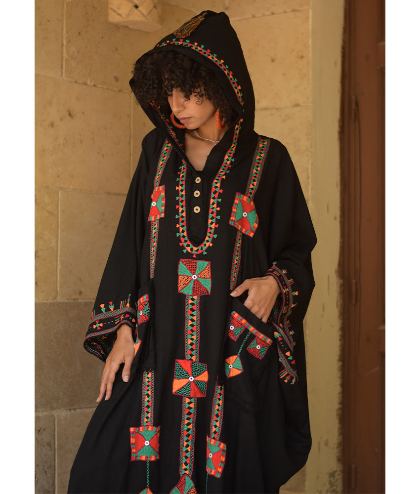 Black Siwa Embroidered Linen Kaftan with Hoodie handmade in Egypt & available at Jozee Boutique.