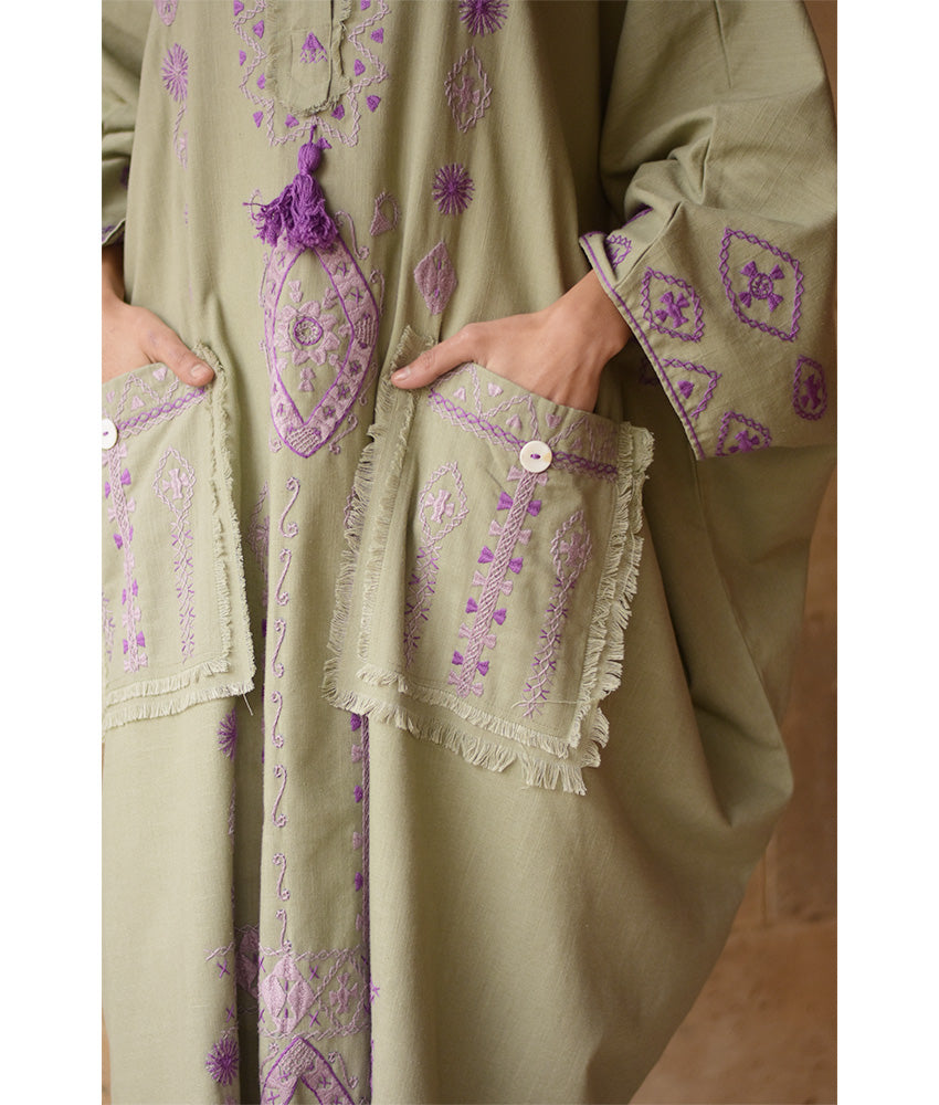 Light olive Siwa Embroidered Linen Kaftan with Hoodie handmade in Egypt & available at Jozee Boutique.