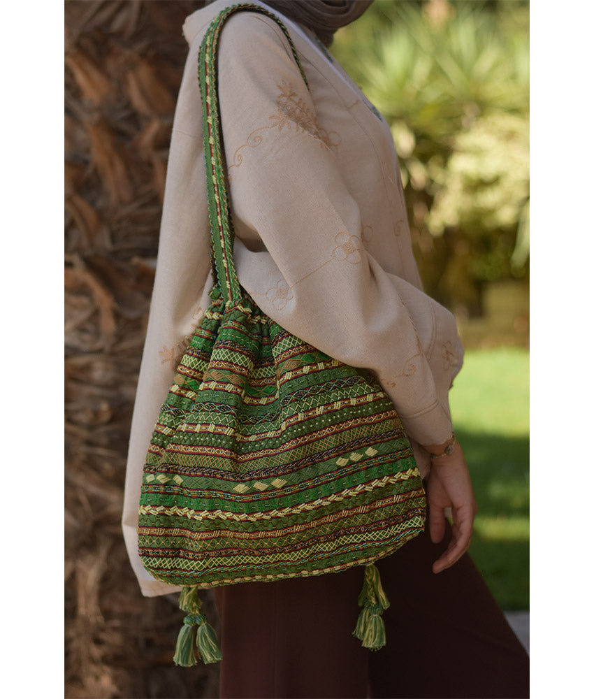 Green Beaded Saint Catherine handbag handmade in Egypt & available in Jozee boutique