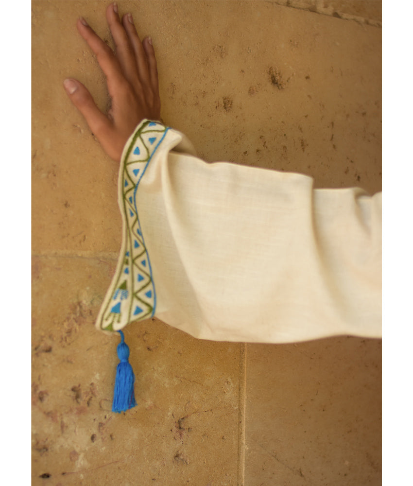 Off white Siwa Embroidered Linen Dress with Hoodie handmade in Egypt & available at Jozee Boutique.