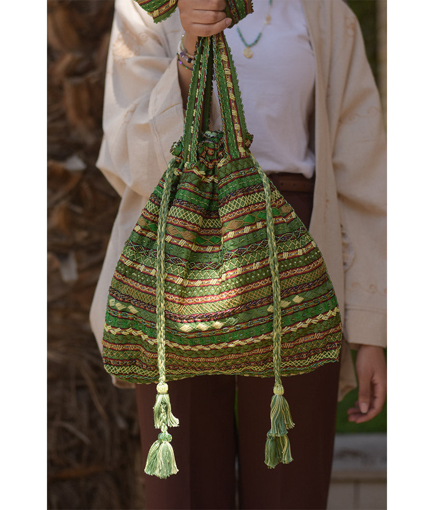 Green Beaded Saint Catherine handbag handmade in Egypt & available in Jozee boutique