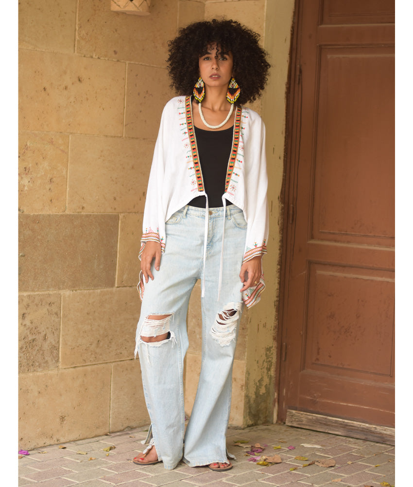 White Siwa Embroidered Linen Bolero made in Egypt & available at Jozee Boutique.