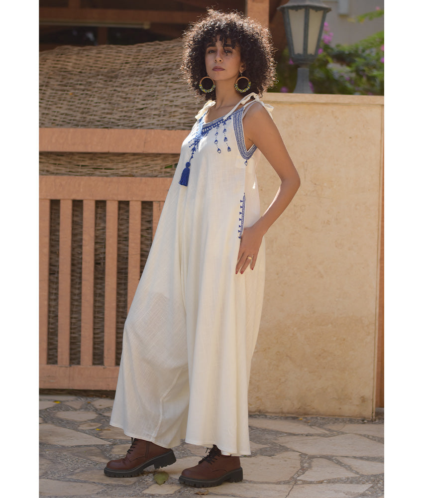 White Siwa Embroidered Linen Flowy Jumpsuit/Dress handmade in Egypt & available at Jozee Boutique.