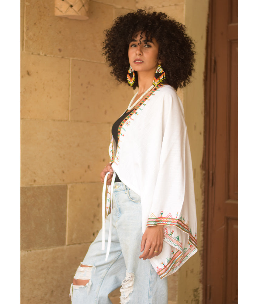 White Siwa Embroidered Linen Bolero made in Egypt & available at Jozee Boutique.