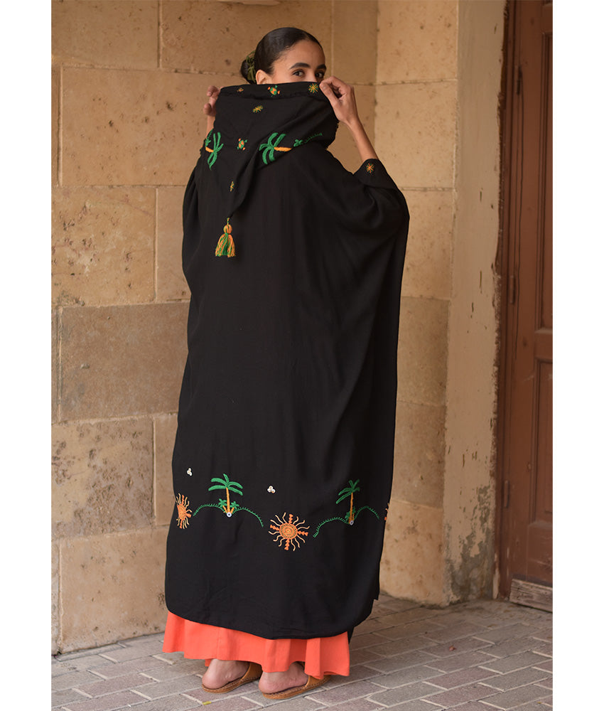 Black Siwa Embroidered Linen Cardigan/Abaya with Hoodie handmade in Egypt & available at Jozee Boutique.