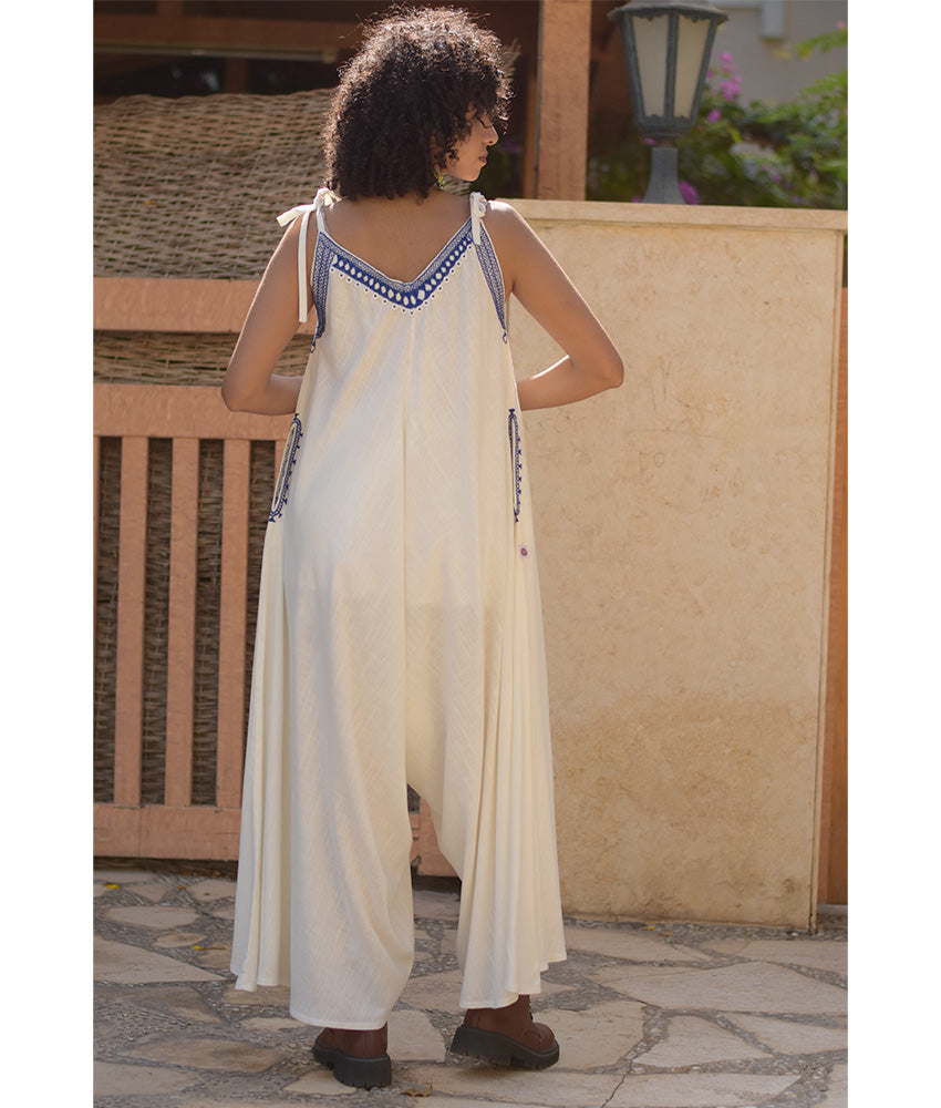 White Siwa Embroidered Linen Flowy Jumpsuit/Dress handmade in Egypt & available at Jozee Boutique.